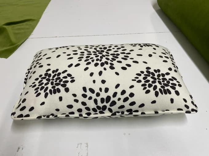 Custom cream pillow with black sunburst pattern