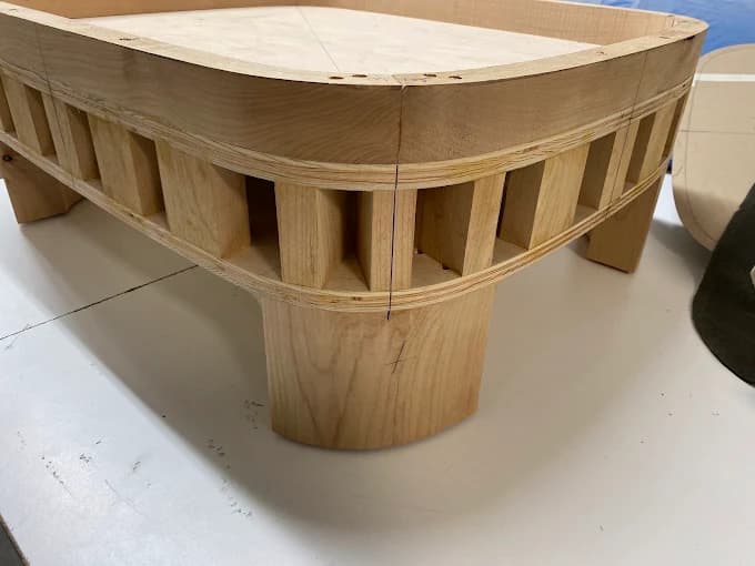 Close-up of custom rounded wood furniture construction